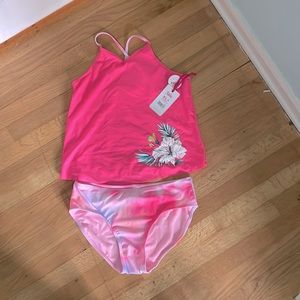 Justice Girls XL+ swim suite.  Tags still on.